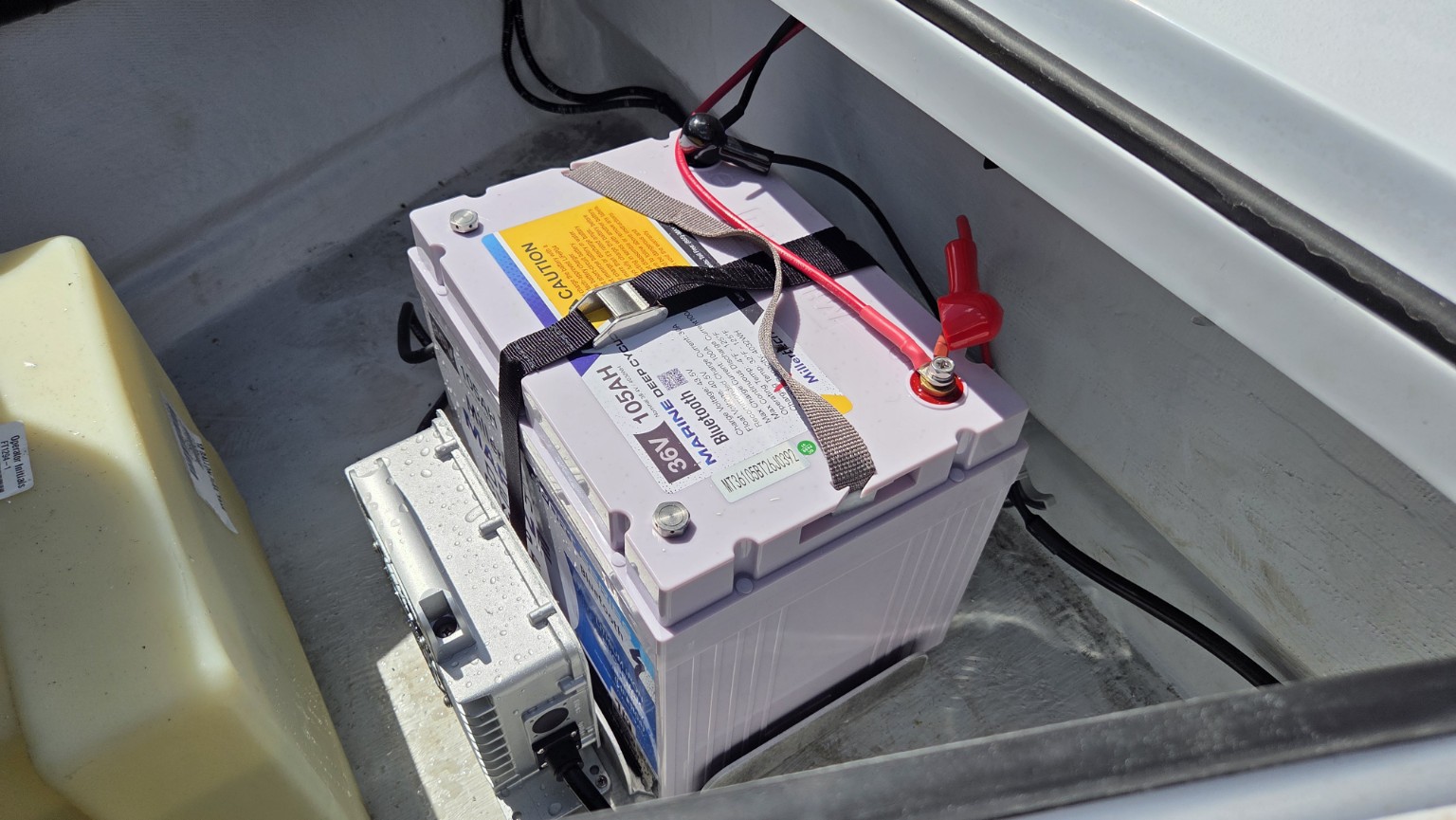 The installed Millertech 105Ah lithium battery.