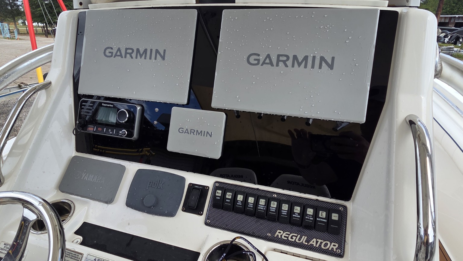 Twin Garmin 9213XSV displays, Garmin autopilot controls and the custom acrylic dash panel.