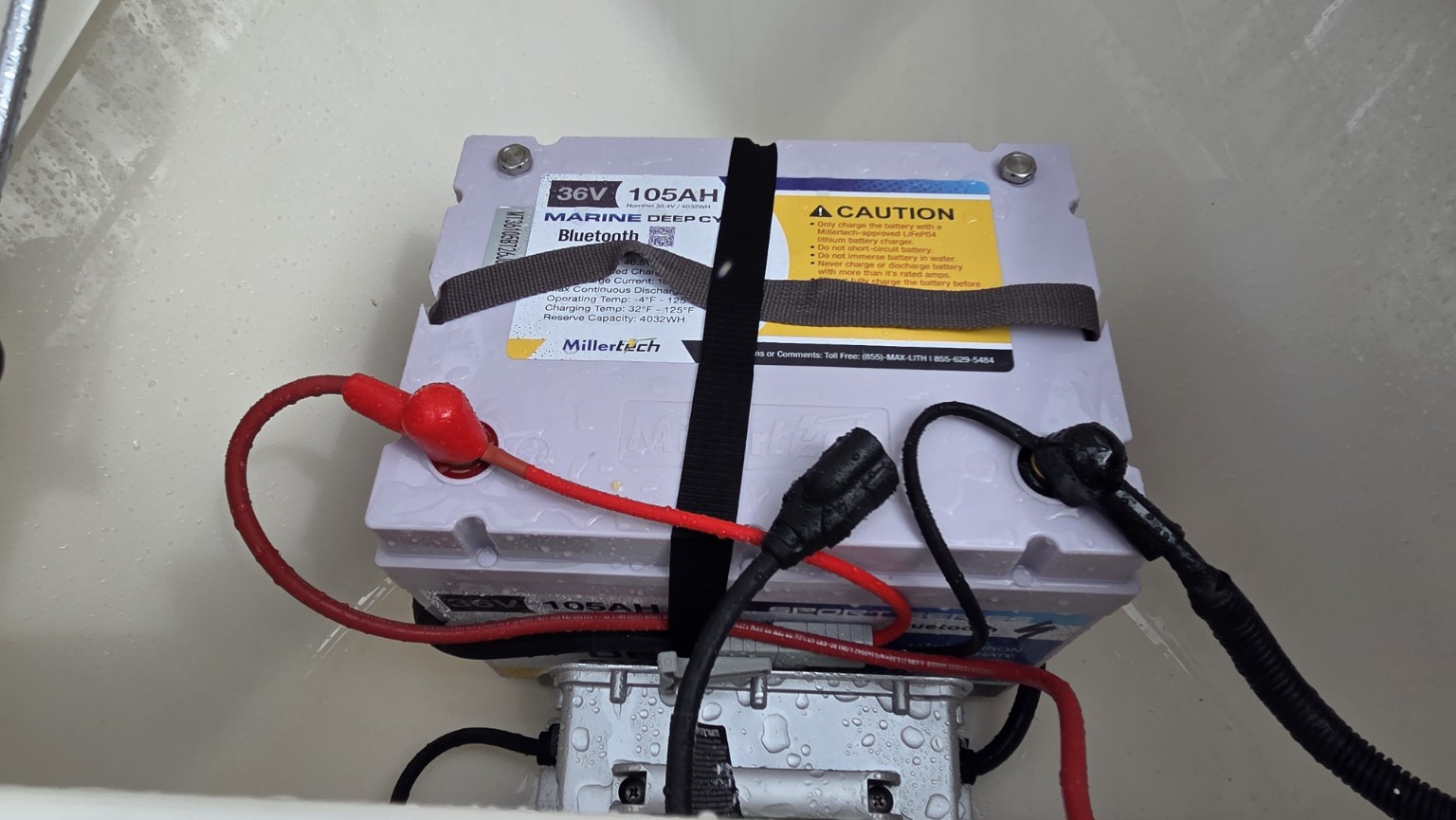 The 36V, 105Ah Millertech lithium battery and charger powering the trolling motor.